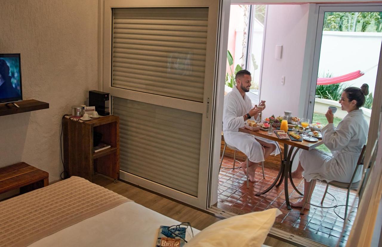 Hotel Boutique Frangipani Brotas Exterior photo A room at the hotel