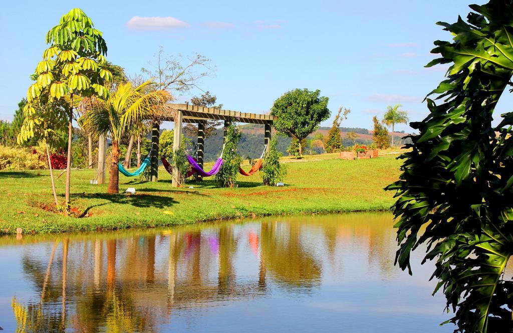 Hotel Boutique Frangipani Brotas Exterior photo View of the lake at the resort